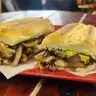 Portabella Bliss — Portabella mushrooms, grilled onion, Swiss cheese, green & red peppers, mayo and avocado